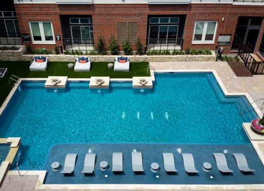 Swimming Pool With Relaxing Sundecks at Berkshire Pullman, Frisco, Texas